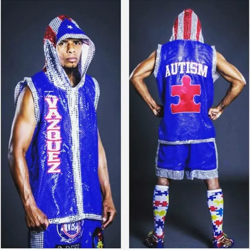 Boxer wearing his boxing clothes supporting autism awareness