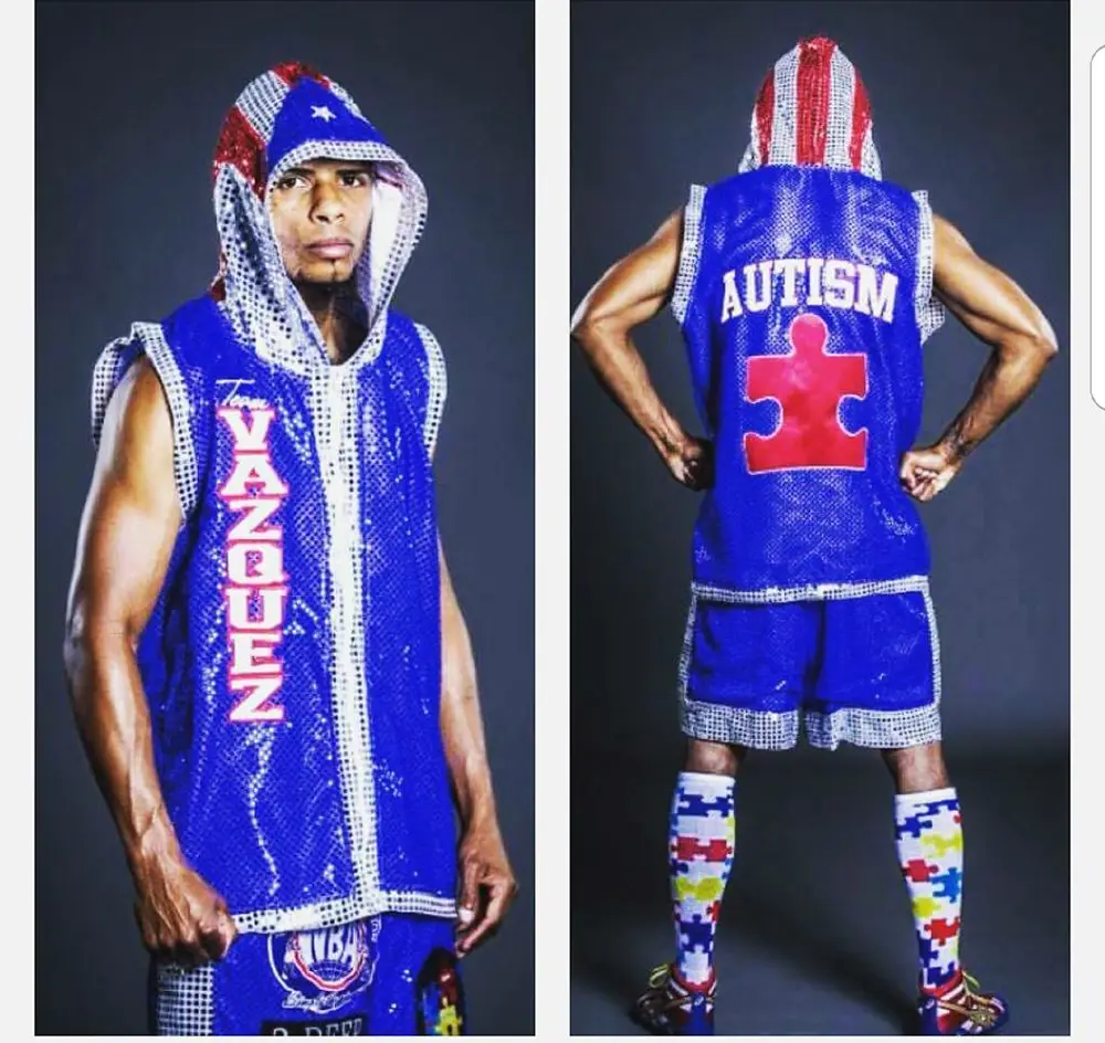 Boxer wearing his boxing clothes supporting autism awareness