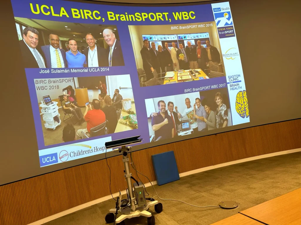 Picture of a slide show presented at event. With various members and boxing celebrities supporting the cause.