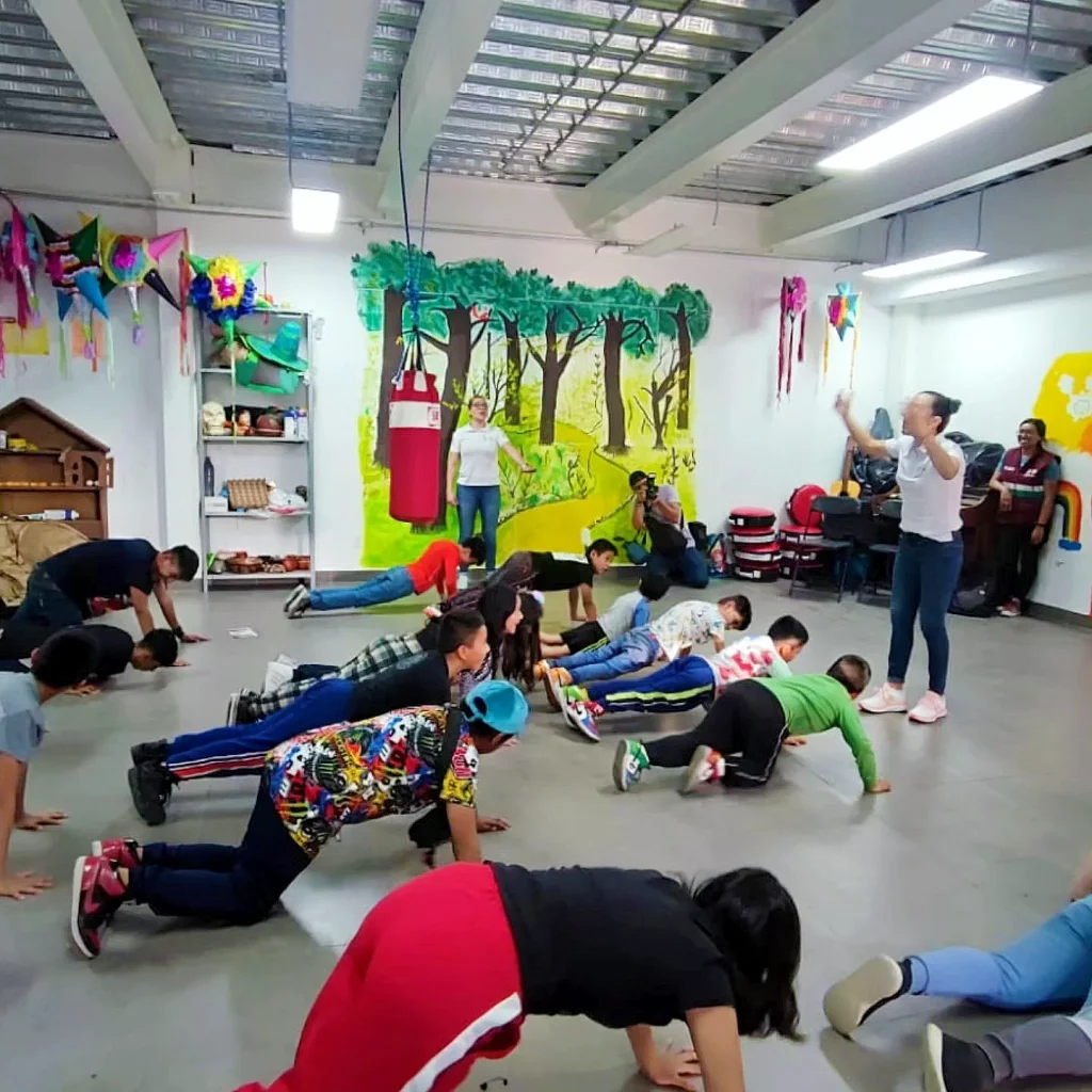 Champion Irma Garcia Tor teaching some stretching exercises to the attendees