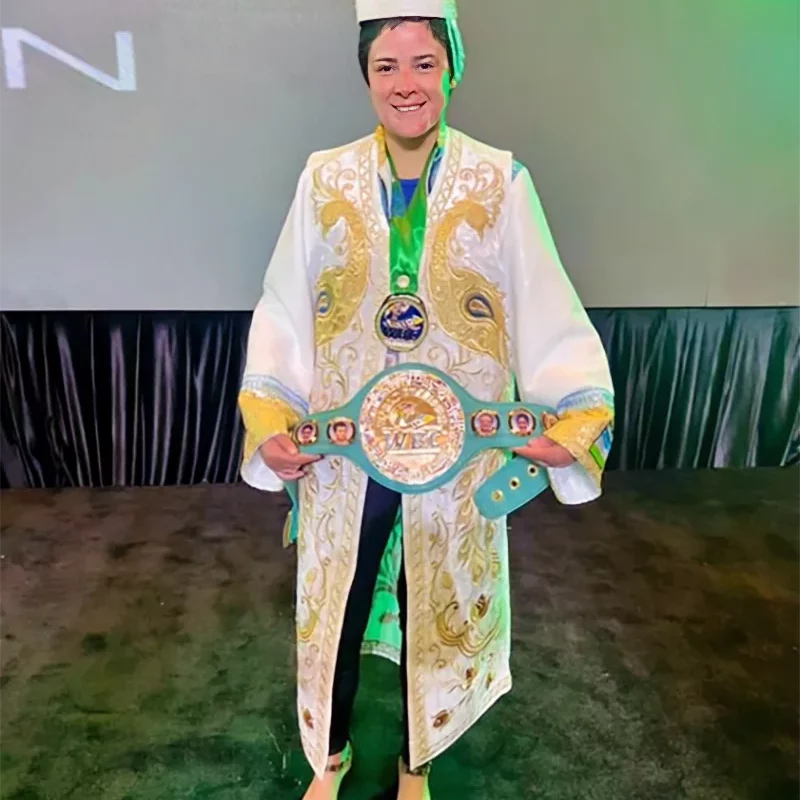 Dyana Sanchez joins posing with a WBC belt replica as she joins the WBC Cares team