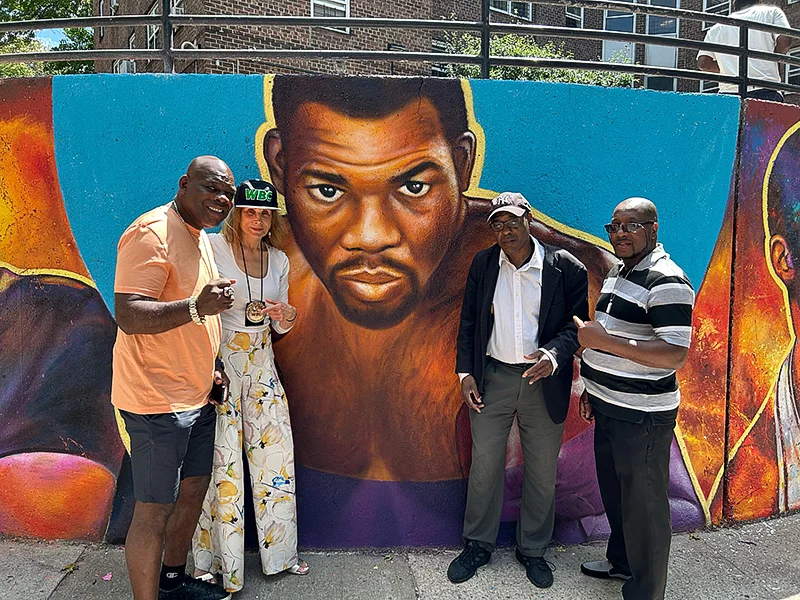 Iran Barclay, jill Diamond Dennis Milton, Jr Jones, posing and honoring the reveal of the new Iran Barclay mural at Patterson Projects in the Bronx.