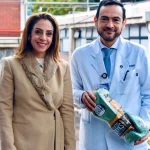 Christine Manzur, President of WBC Cares Mexico donating a pair of gloves, in behalf of Cleto Reyes, to the Instituto Nacional de Cancerología