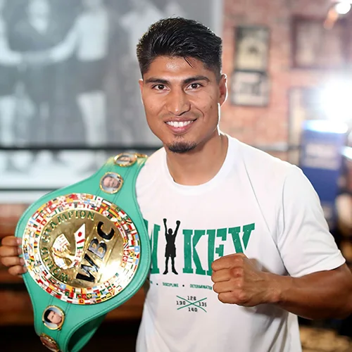 Mikey Garcia posing with his WBC champion belt