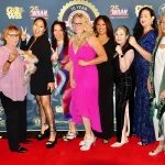 Participants of the International Women’s Boxing Hall of Fame 2023 posing on stage for the camera