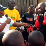 WBC Cares - Africa Cares representatives presenting some donations to the participants at the event