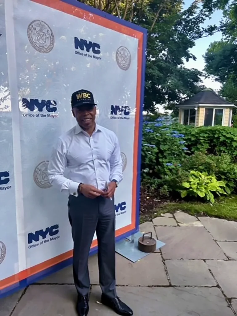 Mayor of New York, Eric Adams posing at the Juneteenth event in NY