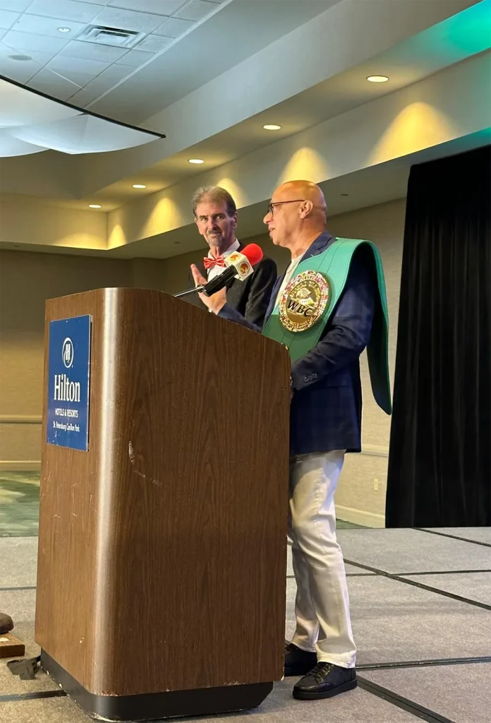 Willie "Papo" Vargas speaking at the podium
